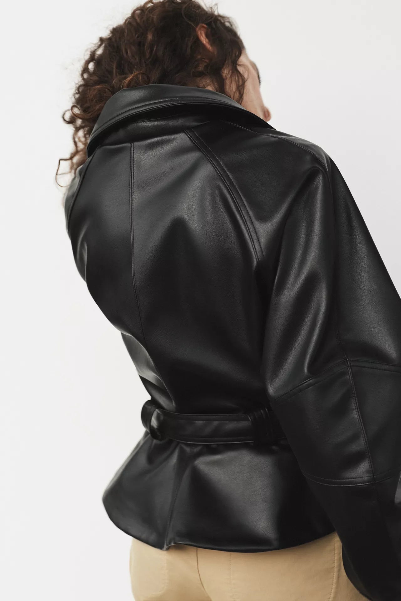 BELTED LEATHER EFFECT JACKET